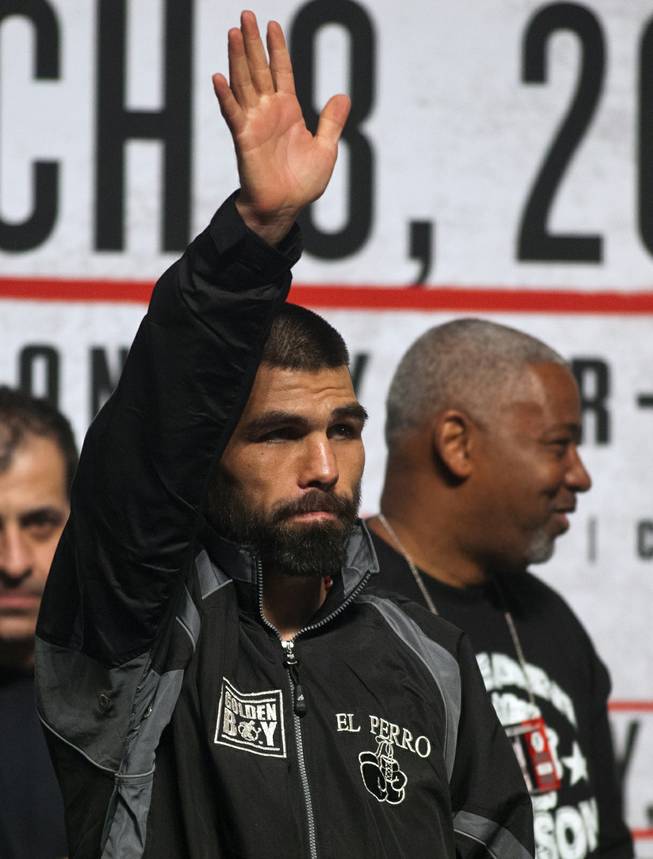 Alfredo "El Perro" Angulo greets the fans as he steps up on stage at the MGM Grand Arena on Friday, March 07, 2014.  L.E. Baskow